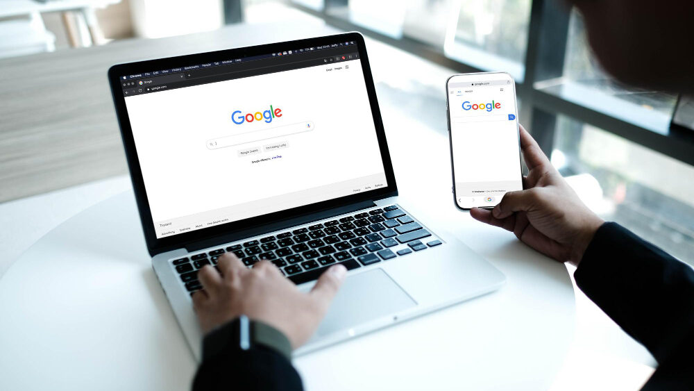 a man using google to create a google business profile